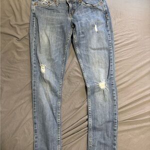 6.Levi's Blue Distressed Skinny Jeans